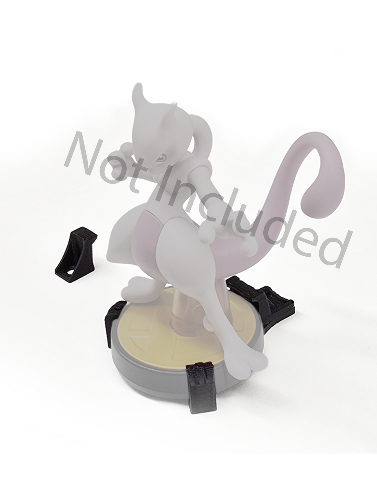 Transparent cat-shaped object with black attachments on a white background