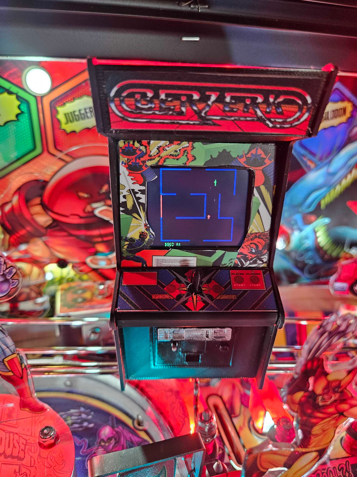 berserk mini arcade toy on deadpool pinball