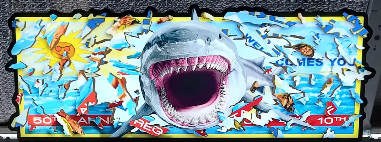 Shark-themed sign with colorful design and text on a black background