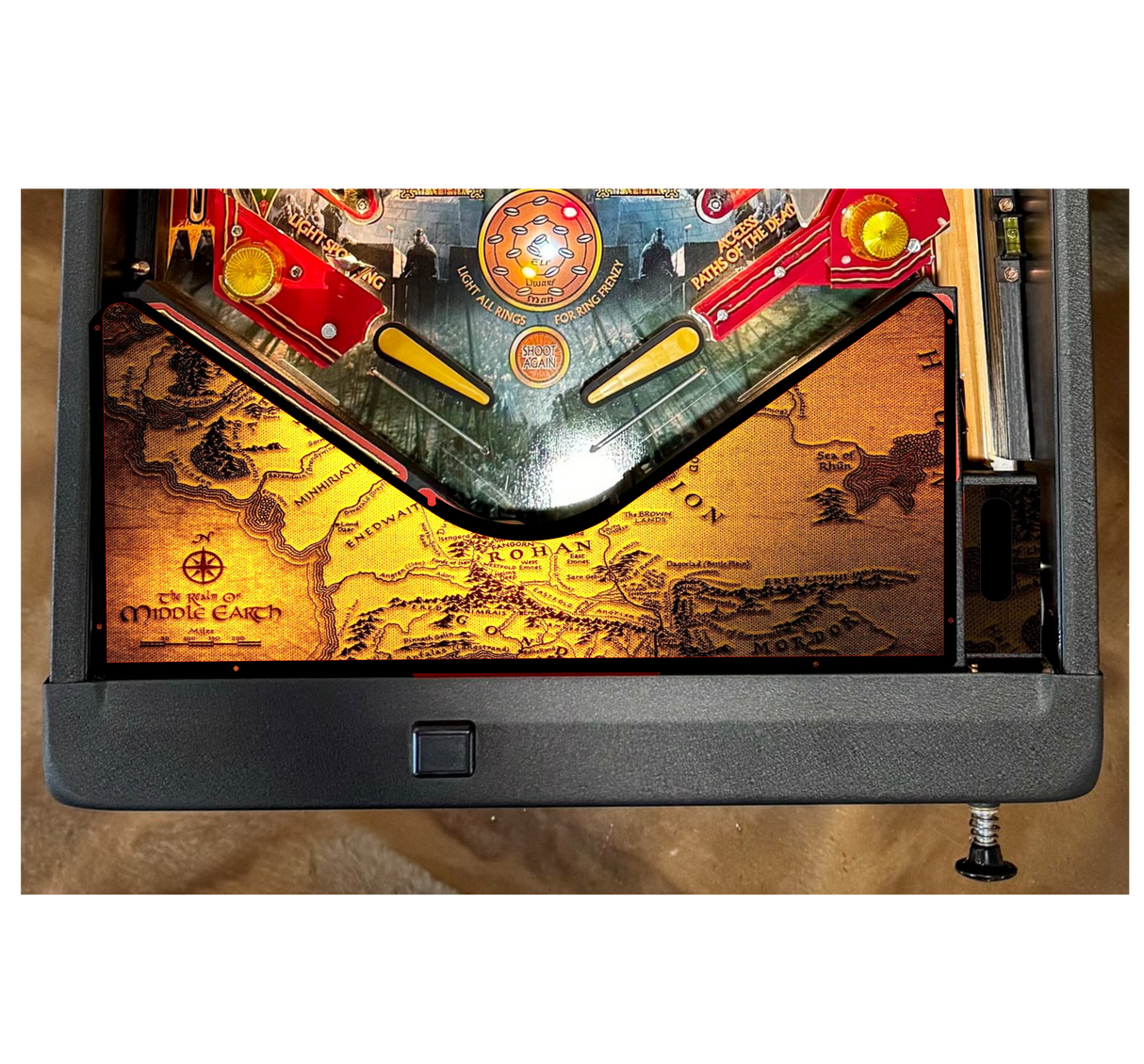 Pinball machine with a detailed map design on the playfield