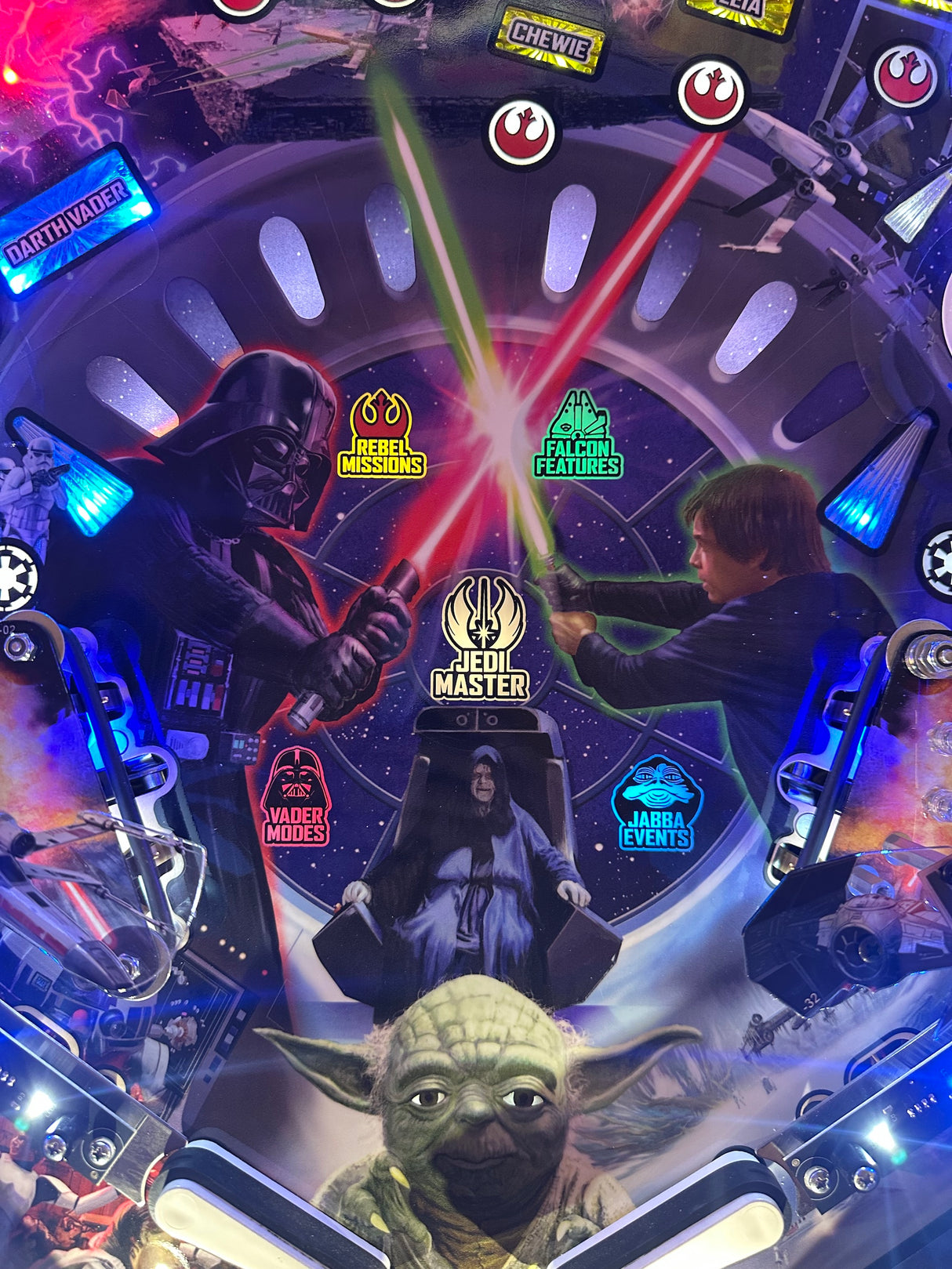Star Wars-themed pinball machine with characters and symbols.