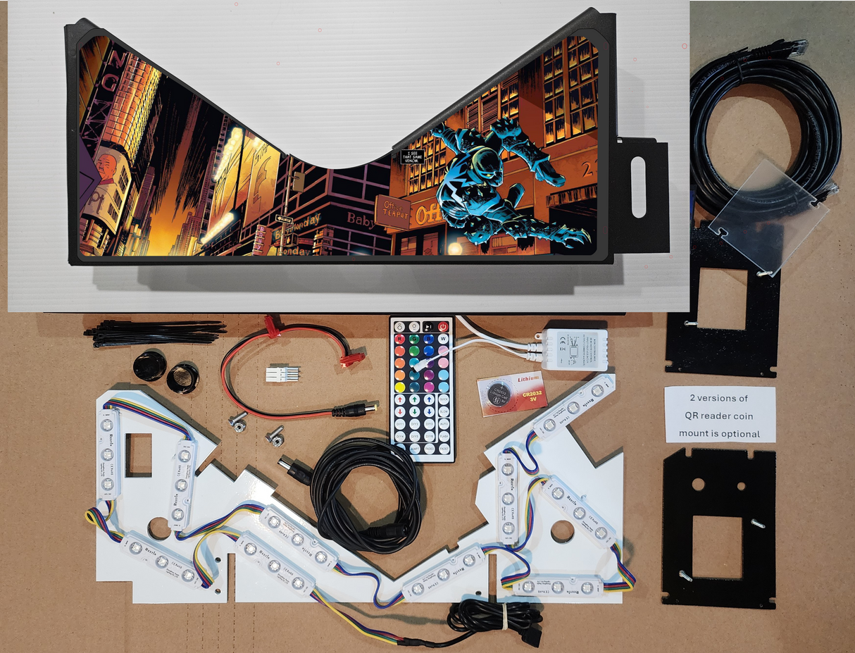 Pinball machine with Venom artwork on a white background with electronic parts on a brown background