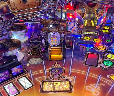 Pinball machine playfield with colorful lighting