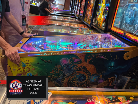 Pinball machines at Texas Pinball Festival 2026 with a person interacting with one of them.