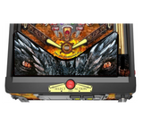 Pinball machine with detailed artwork and a red button on a white background