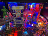 Pinball machine with colorful lights and various game components