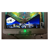 Pinball machine with digital display and green button on a white background