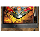 Pinball machine with a detailed map design on the playfield