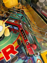 red pinballs on a Pokemon pinball machine