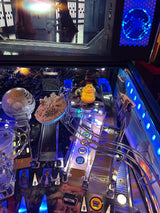 star wars pinball machine playfield and backbox featuring speaker lights, ramp illumination and light up star wars toys