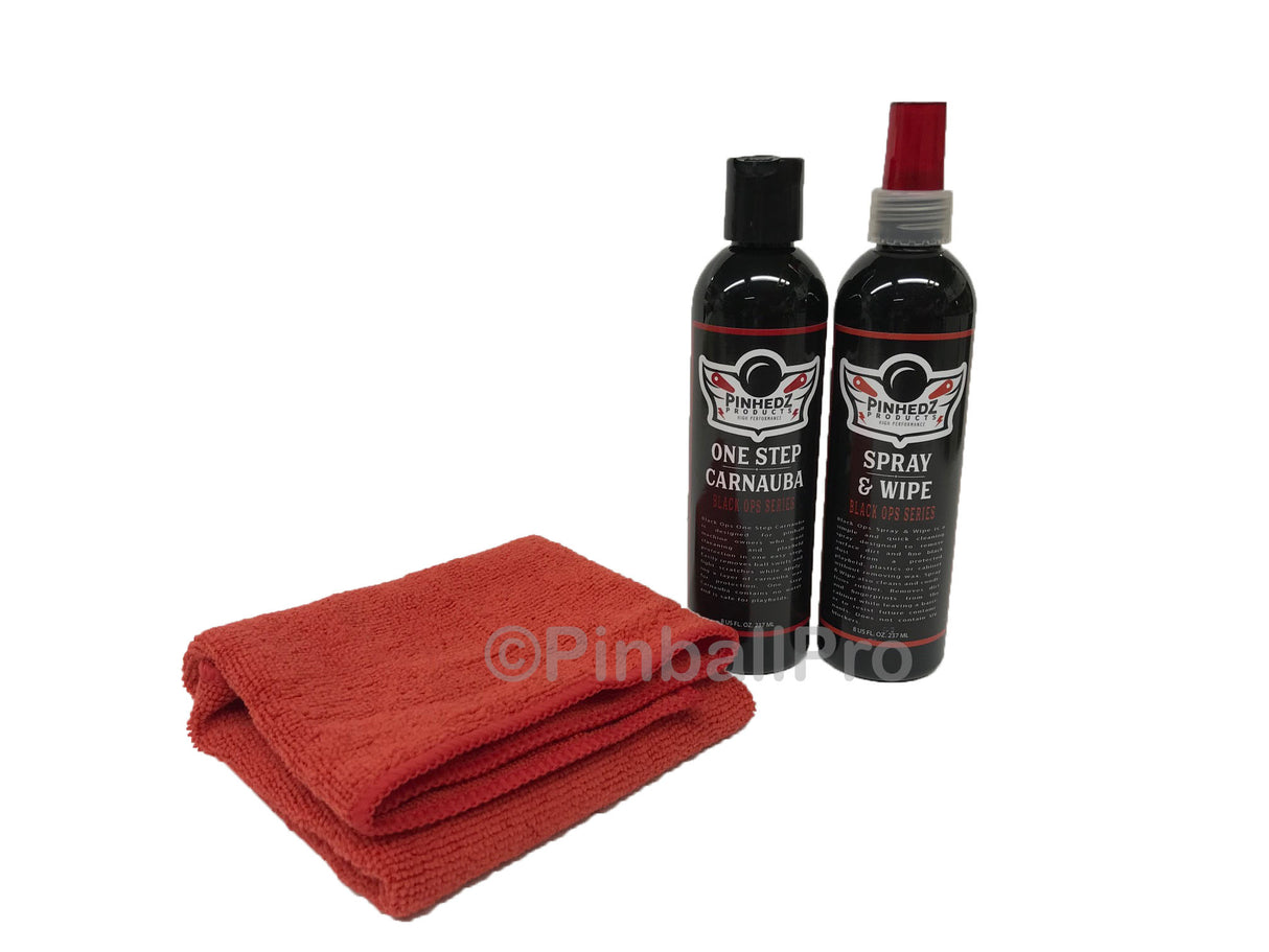 Two bottles of Pinhedz carnauba wax and cleaning solution alongside a red microfiber cloth, all displayed on a white background.